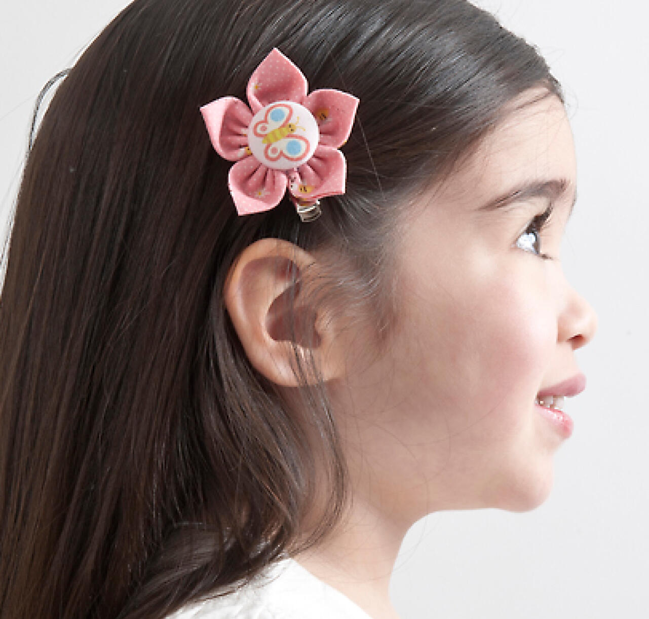 Image of a hairlip with illustrated butterfly on a child